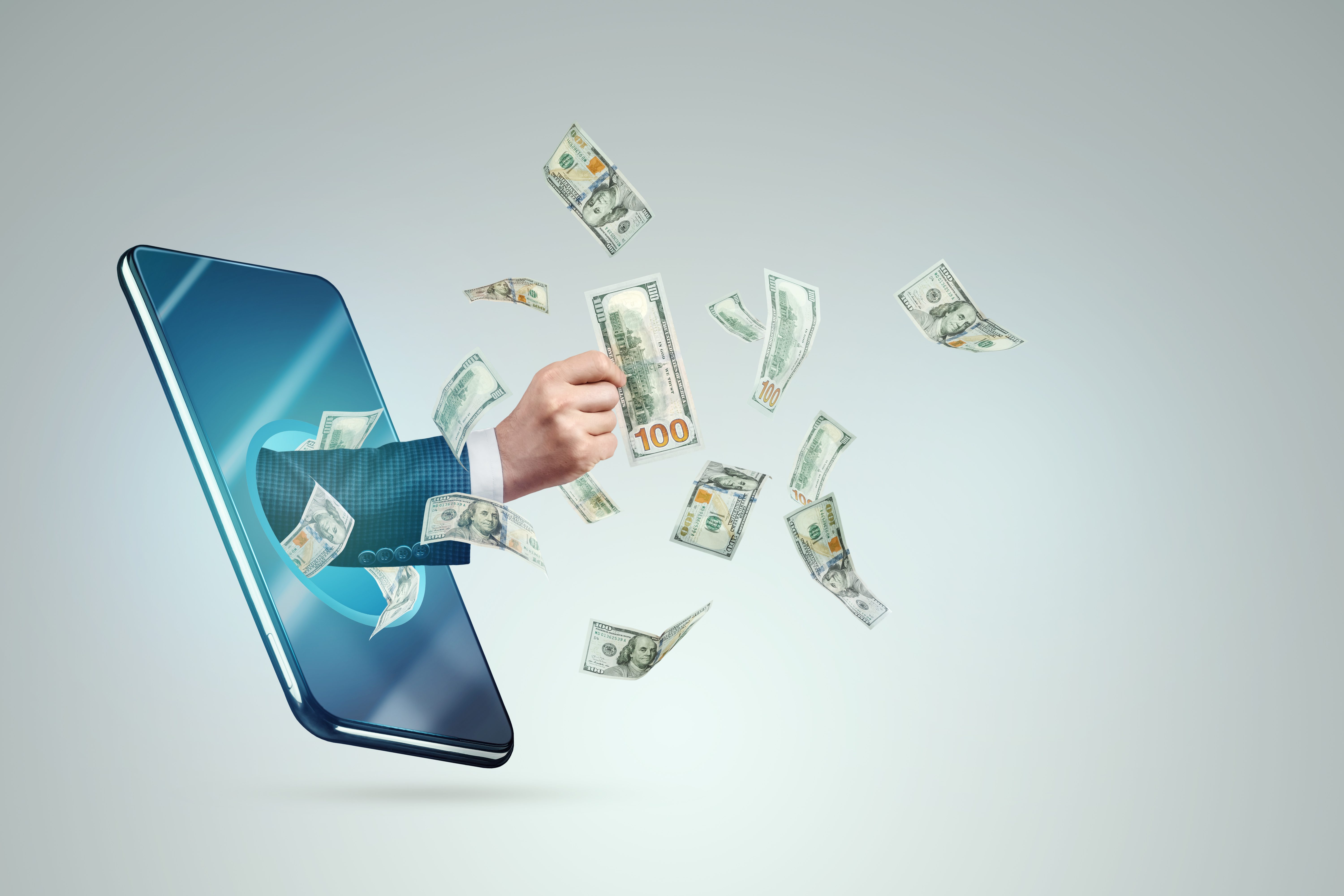 A hand from a smartphone transfers money and dollars fly out.